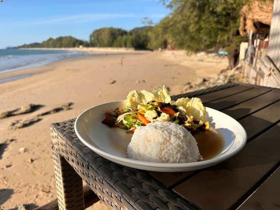 Veg and rice on a beach in being vegan in Thailand